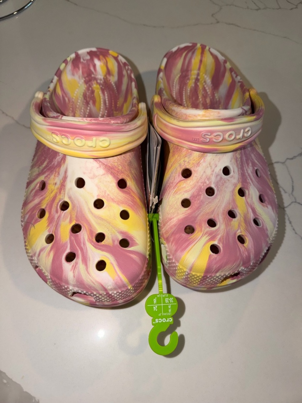 CROCS Glow-in-the-Dark Marbled Pink and Yellow Classic Clog